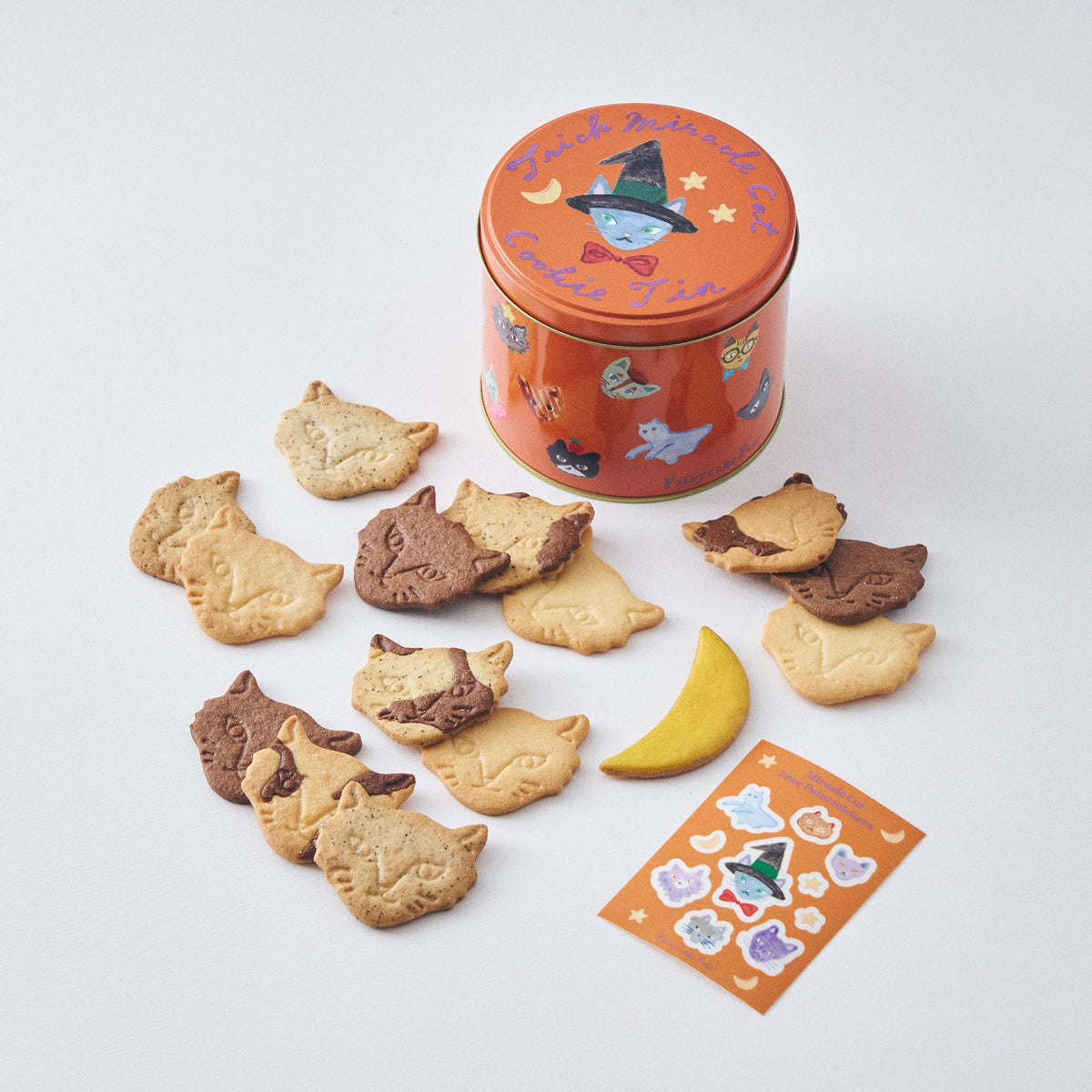 10/1発売開始【期間限定】Trick Miracle Cat Cookie Tin (神様のいたずらトリックネコクッキー缶) フェイスシール付き